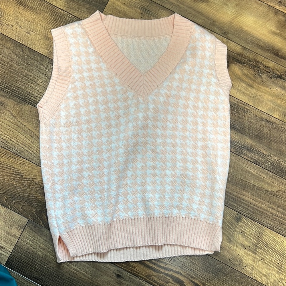 Peach colored sweater vest brand new